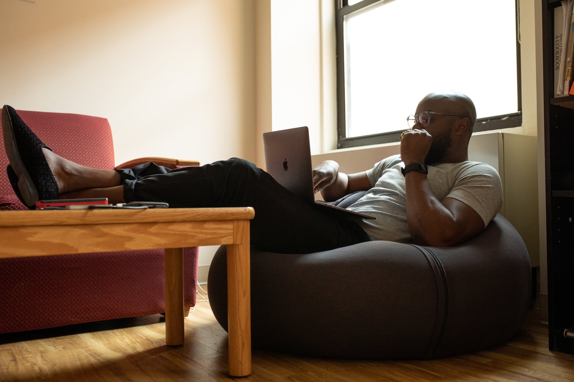 man using laptop, smart money bro